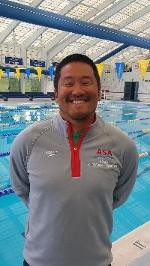 A person standing in a swimming pool

Description automatically generate